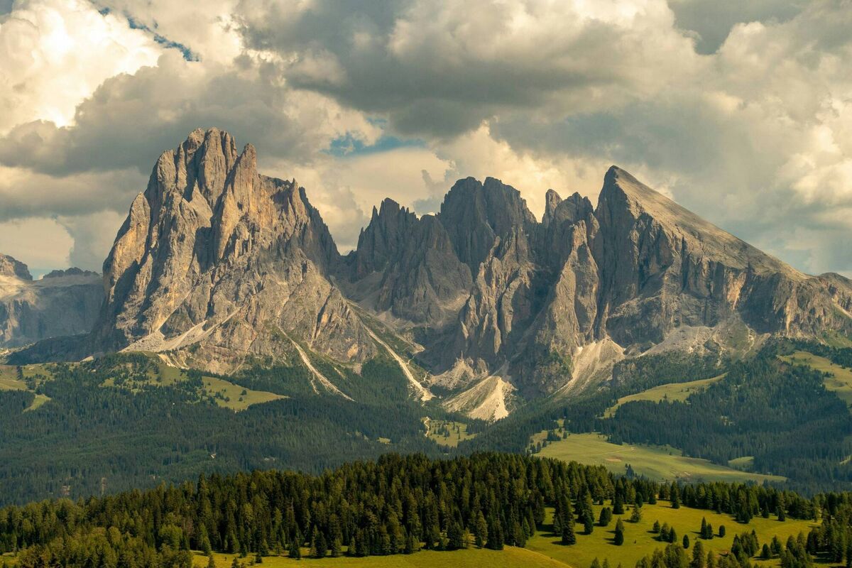 For a different side of summer, the Dolomites offer cooler air, alpine lakes and mountain landscapes that reward further exploration. For a different side of summer, the Dolomites offer cooler air, alpine lakes and mountain landscapes that reward further exploration.