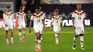 <p>Germany's Jamal Musiala appears dejected after defeat in the penalty shoot-out. Pic: Nick Potts/PA Wire.</p>