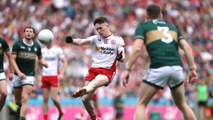 <p>Tyrone Eoin McElholm shoots against Kerry. Pic: ©INPHO/Bryan Keane</p> <p>Tyrone Eoin McElholm shoots against Kerry. Pic: ©INPHO/Bryan Keane</p>