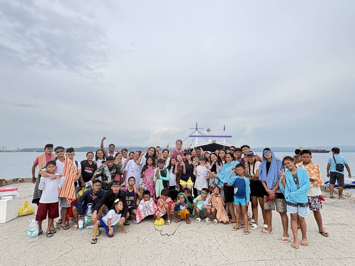 Richard Hogan with locals and representatives of the sponsor Aercap on his recent trip to the Badjao community in the Philippines