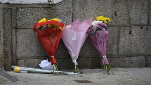 <p>Flowers left close to the scene where a serious stabbing incident took place on Parnell Square East in Dublin. File picture: Gareth Chaney/ Collins Photos</p>
