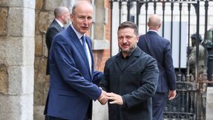 <p>Taoiseach Micheal Martin welcomes Ukraine's President Volodymyr Zelensky as he arrives ahead of a formal ceremony to mark the launch of Ireland's eighth EU presidency, at Dublin Castle. Photo by Paul Faith / POOL / AFP via Getty Images</p>