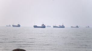 Commercial vessels are seen in the Strait of Hormuz off Bandar Abbas, Iran (Amirhosein Khorgooi/AP) Commercial vessels are seen in the Strait of Hormuz off Bandar Abbas, Iran (Amirhosein Khorgooi/AP)