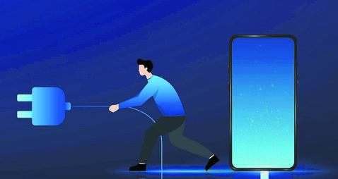 Digital detox concept. A man unplugs his smartphone to take a break from the screen. Symbol of mindfulness, mental health and co