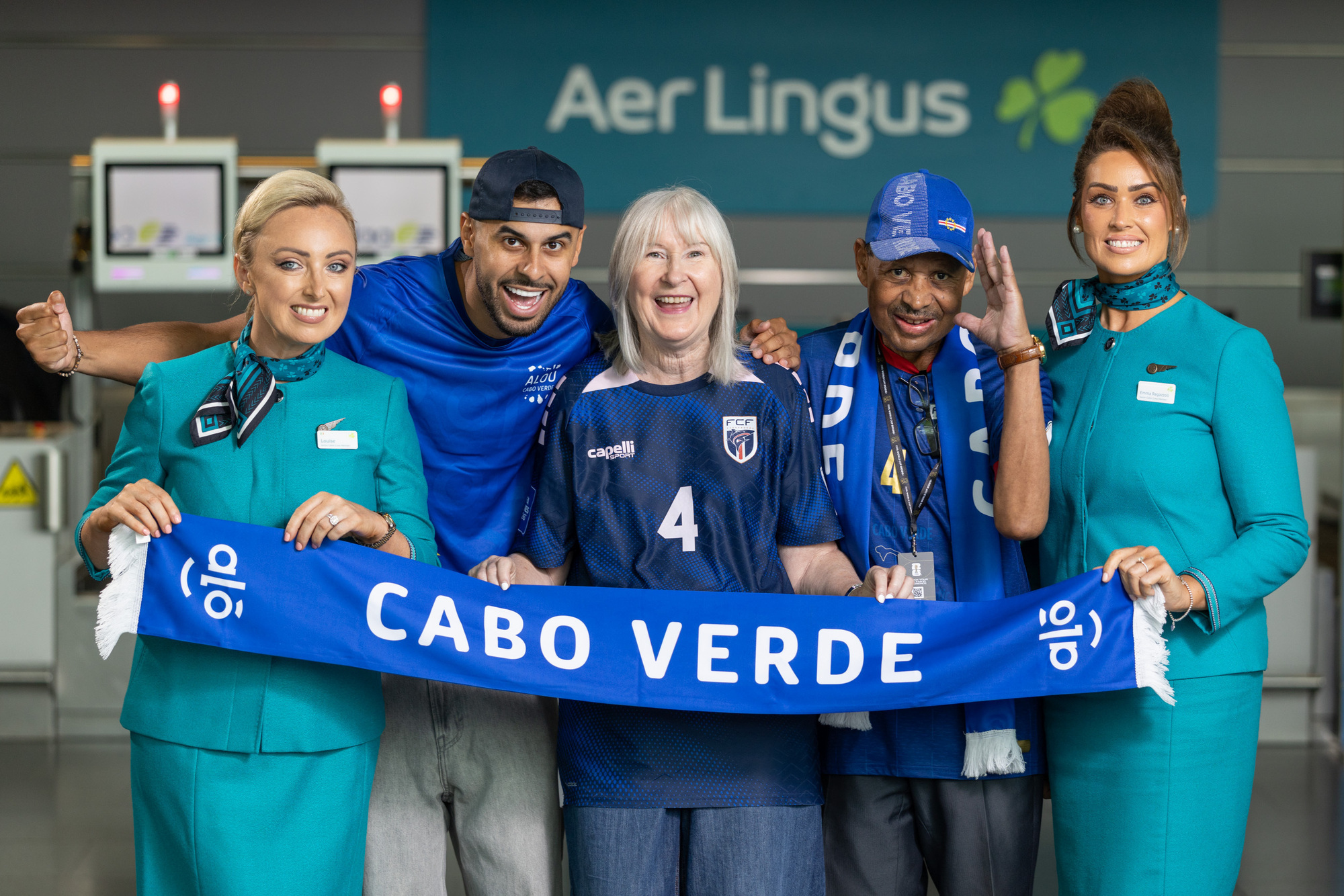 Picture shows Aer Lingus cabin crew members Louise Furlong (left) and Emma Regazzoli (right) with at centre from left Jacques; Judie and Carlos Lopes at Dublin Airport ahead of their flight to Florida. Judie and Carlos Lopes will fly with Aer Lingus to Orlando, and they’ll be cheering for their son Pico on Friday night. Aer Lingus is proud to support the Lopes family’s travel and wishes Pico the very best of luck. For more information on flights and to book the best fares, see www.aerlingus.com Pic:Naoise Culhane-no fee