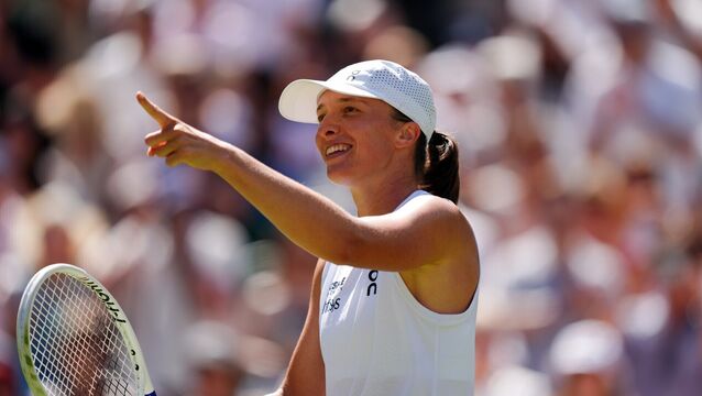 <p>Iga Swiatek celebrates victory following her Ladies' Singles match against Karolina Pliskova. Pic: Ben Whitley/PA</p>