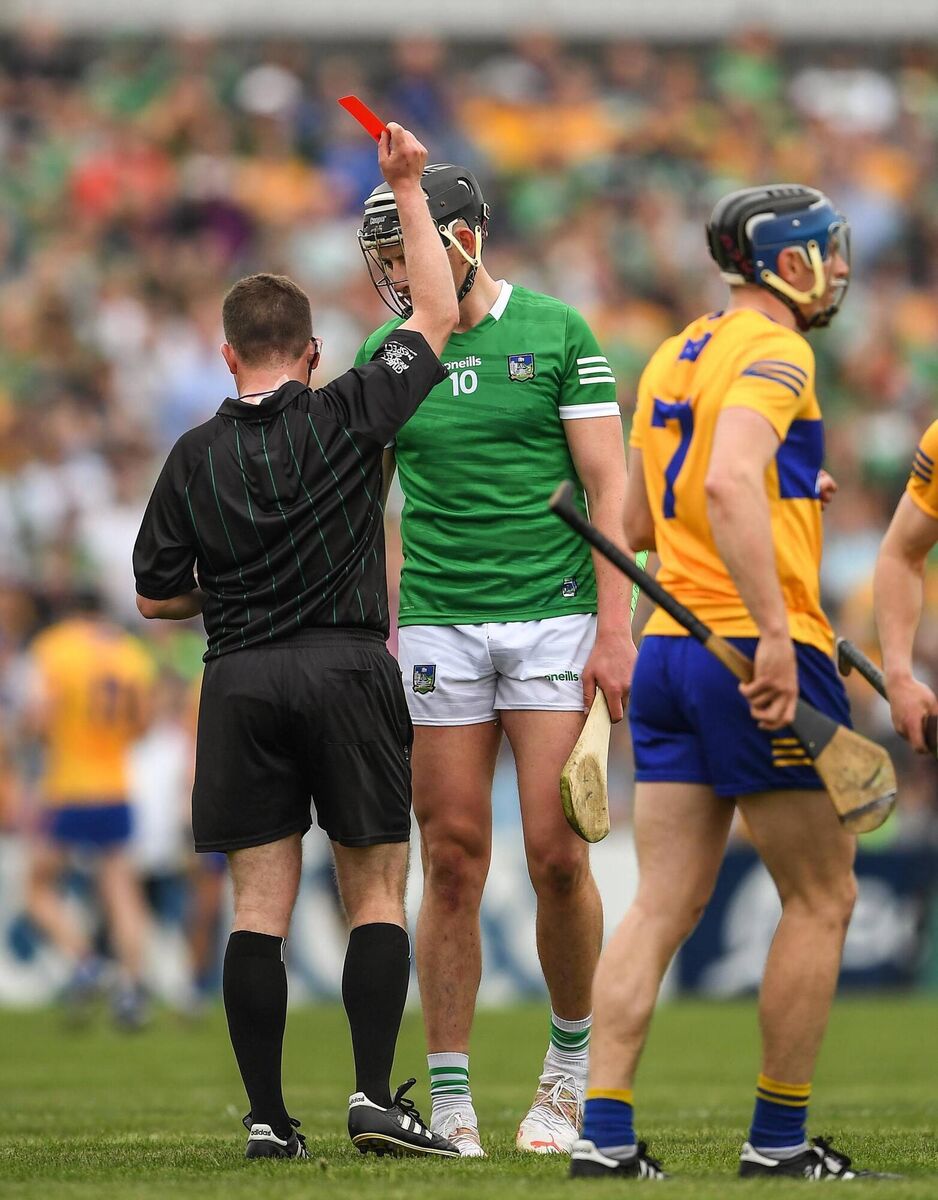 Gearóid Hegarty of Limerick receives a red card from referee Colm Lyons. Pic: Ray McManus/Sportsfile Gearóid Hegarty of Limerick receives a red card from referee Colm Lyons. Pic: Ray McManus/Sportsfile