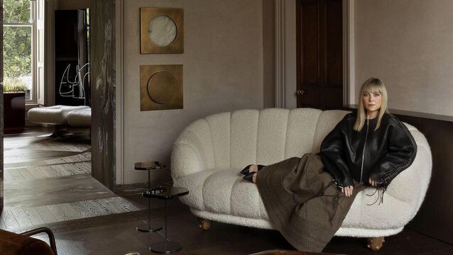 <p>Róisín Lafferty sits on a white bouclé Bryan O’Sullivan croissant sofa in her gallery at her studio at 23 Fitzwilliam Square South, Dublin. Pictures: Barbara Corsico</p>