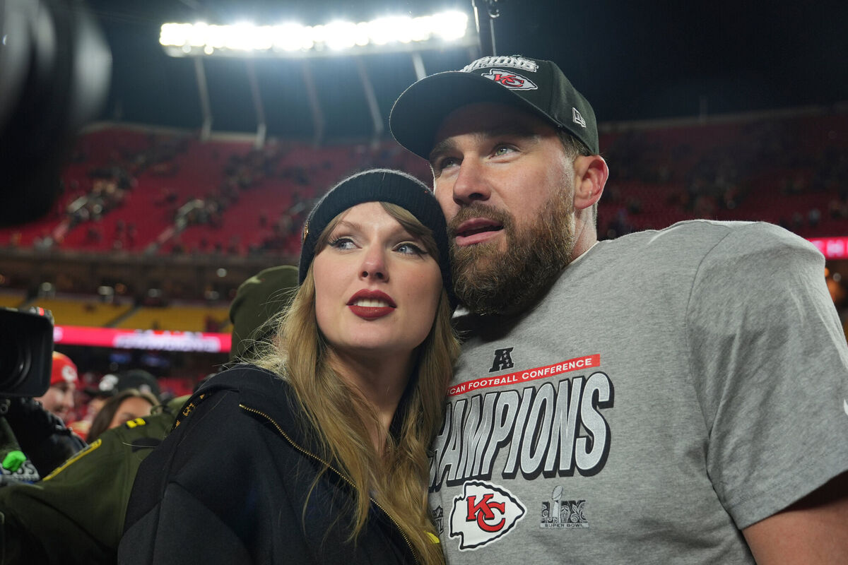 Taylor Swift with Travis Kelce during an NFL football game in Kansas City. Picture: AP Photo/Charlie Riedel, File