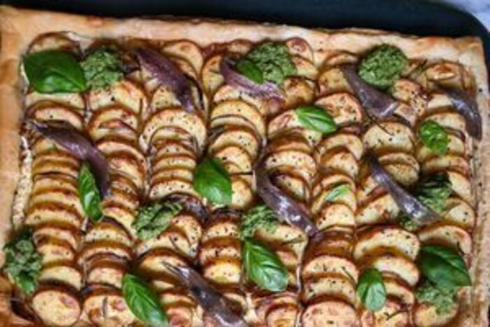 Potato, ricotta and anchovy tart with sunflower seed pesto
