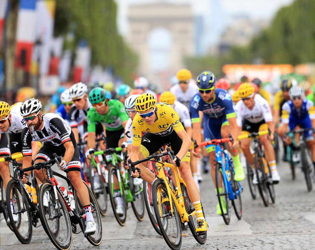 Team Sky's Chris Froome (centre) during stage 21 of the Tour de France in Paris, France. Team Sky's Chris Froome (centre) during stage 21 of the Tour de France in Paris, France.