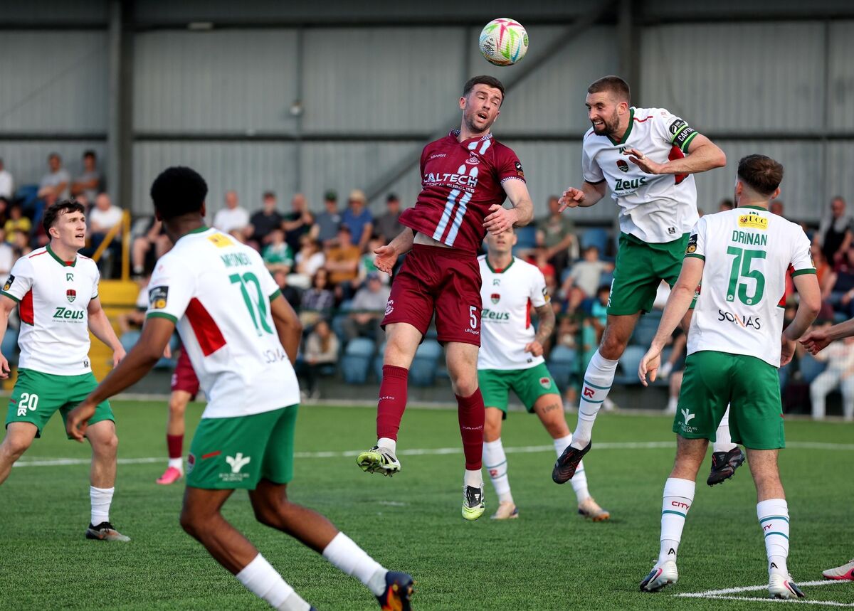  Brendan Frahill, Cobh Ramblers, Fiacre Kelleher, Cork City, battle for the high ball. Pic: Jim Coughlan.