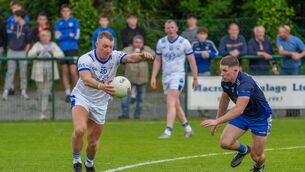 <p>MAIN MAN: Castlehaven’s Brian Hurley shoots for a point as Knocnagree’s David Twomey seeks to block. Pic: Noel Sweeney</p>