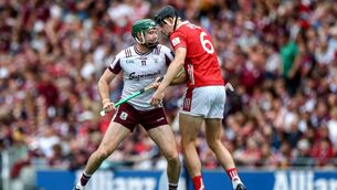 <p>SQUARING OFF: Galway's Cathal Mannion and Cork's Robert Downey get acquainted. Picture: INPHO/James Crombie</p>