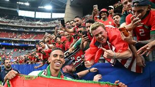 <p>HERO: Morocco striker Soufiane Rahimi joins the fans celebrating Morocco's progress to the World Cup quarter-finals courtesy of their 3-0 win over co-hosts Canada at the Houston Stadium. Pic: Ronaldo Schmeidt, Getty Images</p> <p>HERO: Morocco striker Soufiane Rahimi joins the fans celebrating Morocco's progress to the World Cup quarter-finals courtesy of their 3-0 win over co-hosts Canada at the Houston Stadium. Pic: Ronaldo Schmeidt, Getty Images</p>