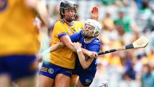 <p>Tipperary's Clodagh McIntyre is tackled by Ellen Casey of Clare. Pic: INPHO/Grace Halton</p>