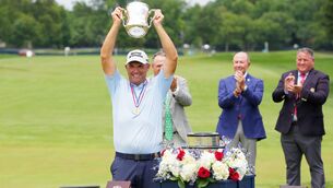 <p>WINNER WINNER: Padraig Harrington raises aloft the Francis D. Ouimet Memorial Trophy after winning the US Senior Open Championship at Scioto Country Club in Columbus, Ohio. Pic: Dylan Buell/Getty Images</p>
