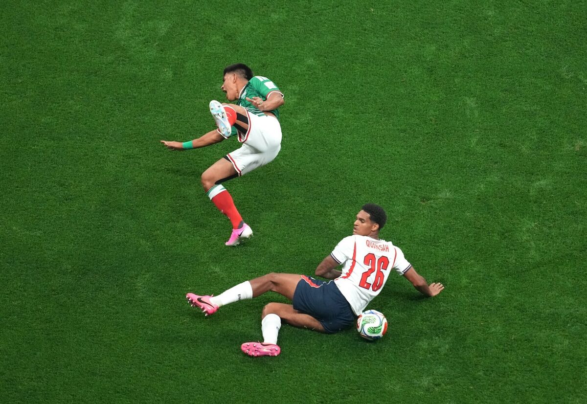 England's Jarell Quansah tackles Mexico's Jesus Gallardo resulting in a red card. England's Jarell Quansah tackles Mexico's Jesus Gallardo resulting in a red card.