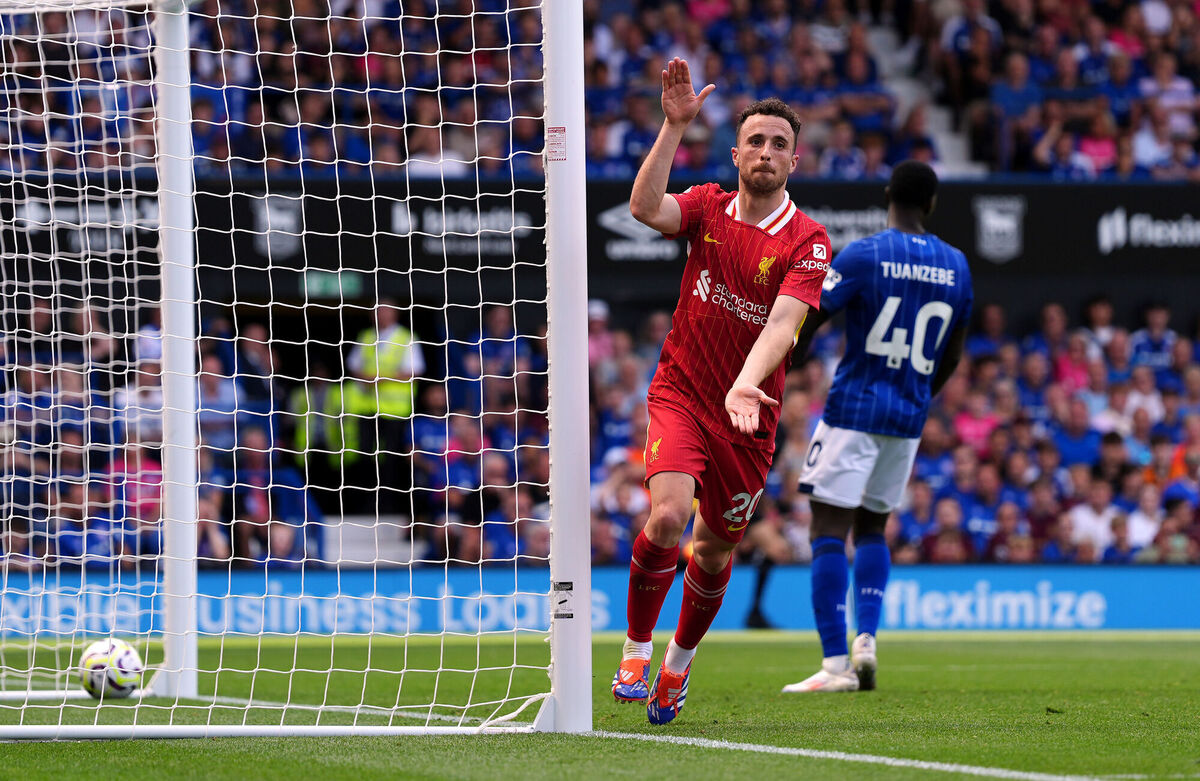 Diogo Jota celebrates scoring the first goal of Liverpool's title winning season. Pic: Bradley Collyer/PA Wire. Diogo Jota celebrates scoring the first goal of Liverpool's title winning season. Pic: Bradley Collyer/PA Wire.