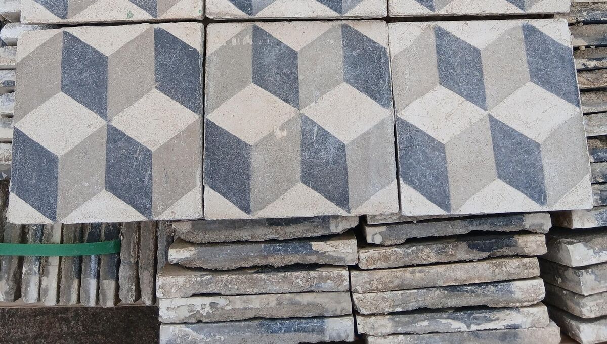 Reclaimed geometric floor tiles at Victor Mee. Reclaimed geometric floor tiles at Victor Mee.