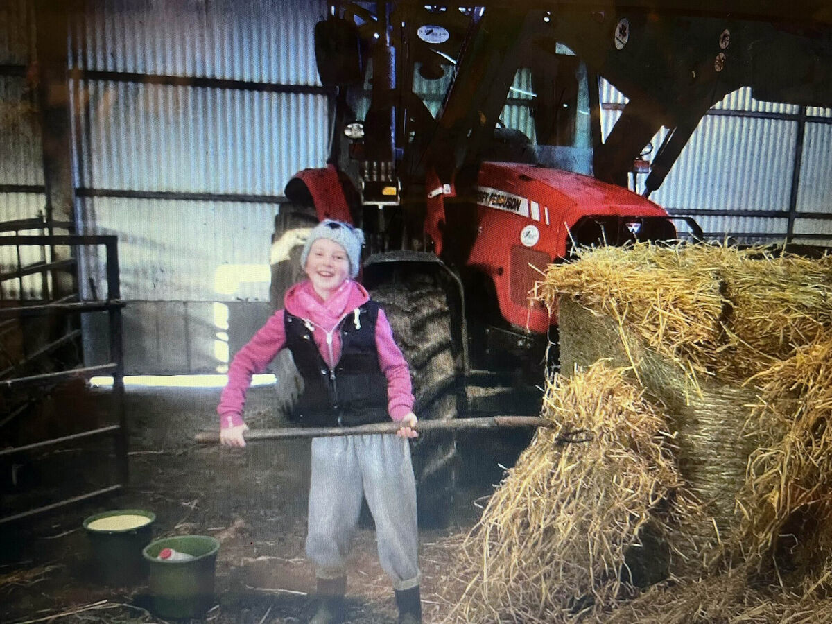 Katelyn Cummins helping out on her family farm Katelyn Cummins helping out on her family farm
