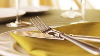 Elegant dinner table setting with shallow depth of field