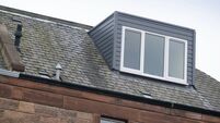 Modern box or flat dormer roof window in the Victorian suburb of Morningside, Edinburgh, Scotland, UK