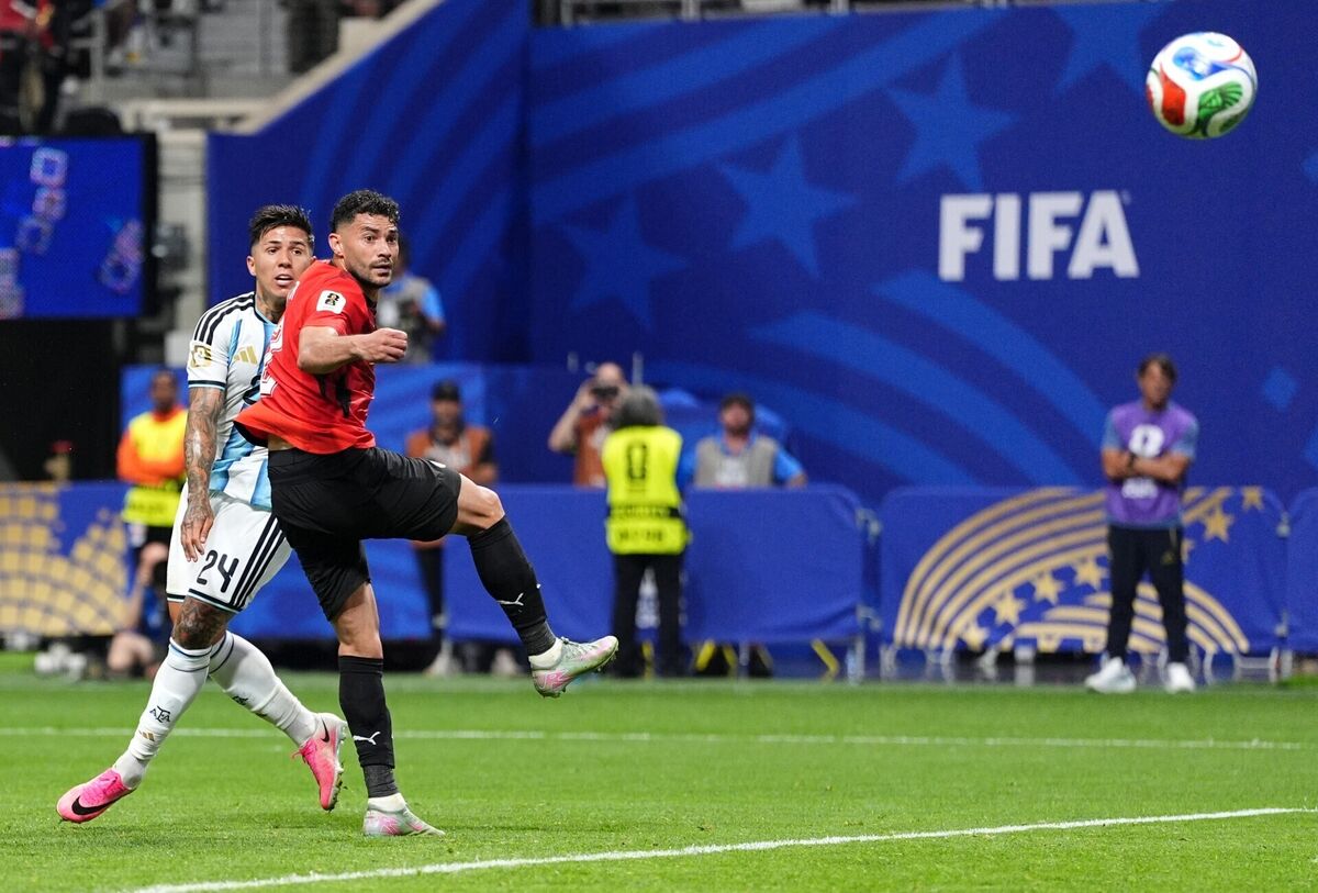 Argentina's Enzo Fernandez scores their side's third goal of the game. Pic: Martin Rickett/PA Wire.