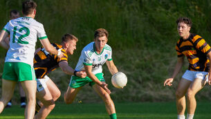 <p>Muskerry’s Liam Twohig negotiates a tackle from the Avondhu defence. Pic: Noel Sweeney</p>