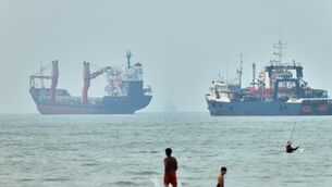 Cargo ships at anchor in the Strait of Hormuz (Amirhosein Khorgooi/ISNA via AP) Cargo ships at anchor in the Strait of Hormuz (Amirhosein Khorgooi/ISNA via AP)