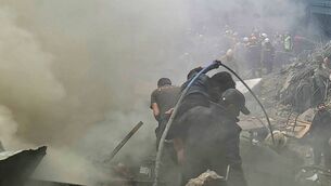 <p>The bomb hit a car in the Sabra area of Gaza City at dusk on Tuesday, killing passerby Mohamed al-Wahidi, director of public relations for the Egyptian Committee in Gaza, 10-year-old boy Hamza al-Deri and his eight-year-old brother Fari. P:icture: Getty Images.</p>