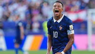 <p>France's Kylian Mbappe celebrates his team's victory at the end of the World Cup round of 16 soccer match between Paraguay and France. Pic: AP Photo/Martin Meissner</p>