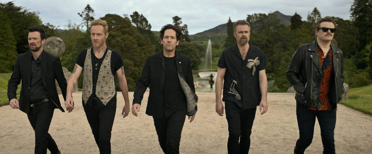 (Left to right) Keith McErlean as Kyle, Peter McDonald as Sandy, Paul Rudd as Rick, Rory Keenan as Binzer, and Paul Reid as Bernard in Power Ballad. Photo: Lionsgate (Left to right) Keith McErlean as Kyle, Peter McDonald as Sandy, Paul Rudd as Rick, Rory Keenan as Binzer, and Paul Reid as Bernard in Power Ballad. Photo: Lionsgate