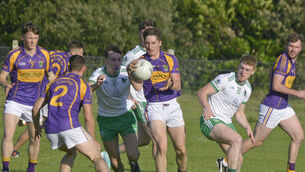 <p> Action from Carbery's meeting with Muskerry last summer. Picture: Denis Boyle</p>