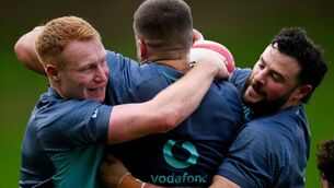<p>TANGLED UP IN BLUE: Ciarán Frawley, left, and Robbie Henshaw during an Ireland rugby squad training session at Leichhardt Oval in Sydney, Australia. Photo by Brendan Moran/Sportsfile</p>