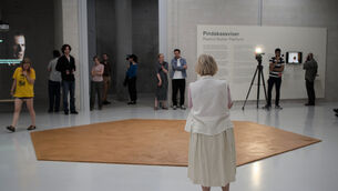 People look at the peanut butter spread across a museum floor (Niels van der Pas/via AP) People look at the peanut butter spread across a museum floor (Niels van der Pas/via AP)