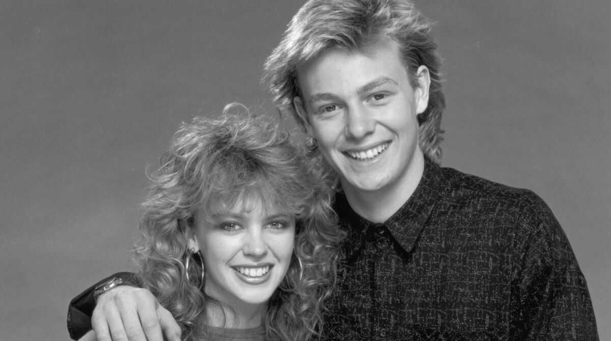 Kylie Minogue and Jason Donovan were the soundtrack to many children's lives in the 1980s. Picture: Dave Hogan/Hulton Archive/Getty Kylie Minogue and Jason Donovan were the soundtrack to many children's lives in the 1980s. Picture: Dave Hogan/Hulton Archive/Getty