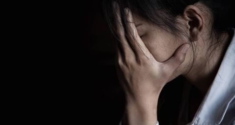 Young woman suffering from a severe depression