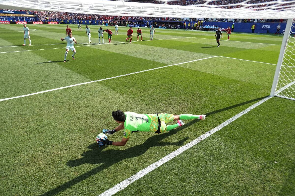 DOWN LOW: Yassine Bounou #1 of Morocco saves a penalty by Kylian Mbappe #10 of France during the FIFA World Cup 2026 Quarter Final match between France and Morocco at Boston Stadium on July 09, 2026 in Foxborough, Massachusetts. (Photo by Lars Baron/Getty Images) DOWN LOW: Yassine Bounou #1 of Morocco saves a penalty by Kylian Mbappe #10 of France during the FIFA World Cup 2026 Quarter Final match between France and Morocco at Boston Stadium on July 09, 2026 in Foxborough, Massachusetts. (Photo by Lars Baron/Getty Images)
