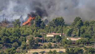 <p>Wildfires have impacted Spain and France in recent weeks. (Photo by Idriss Bigou-Gilles / AFP via Getty Images)</p>