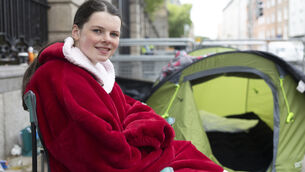 <p>Cara Darmody finishing her last protest outside Leinster House in 2025. She also plans to come back to Leinster House in late September to campaign one day a week until substantial progress is made on this issue. Photo: SAM BOAL/Collins Photos</p>