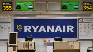 Ryanair said the plane landed normally and passengers returned to the terminal (Paul White/AP) Ryanair said the plane landed normally and passengers returned to the terminal (Paul White/AP)