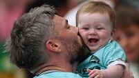 Shane Murphy with his 8 month old son Bowie after the game 27/6/2026
