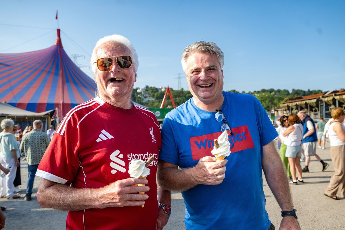 Brendan and Peter McCarthy from Youghal Co Cork tucking into the '99' ice cream cones ahead of James Taylor's concert at Live at the Marquee in Cork. Picture: Chani Anderson