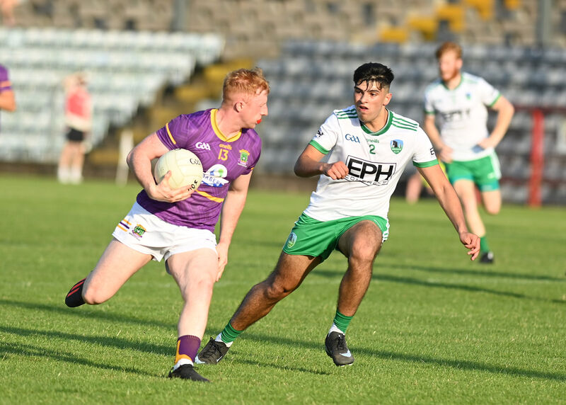 Ryan O'Donovan of Carbery has Muskerry's Ryan Sabas for company. Pic: Martin Walsh. Ryan O'Donovan of Carbery has Muskerry's Ryan Sabas for company. Pic: Martin Walsh.
