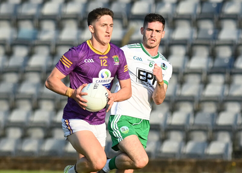 Olan Corcoran of Carbery gets away from Muskerry's Mark Corrigan. Pic: Martin Walsh. Olan Corcoran of Carbery gets away from Muskerry's Mark Corrigan. Pic: Martin Walsh.