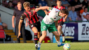 <p> Joshua Fitzpatrick, Cork City, battles Jake Hough, Longford Town. Pic: Jim Coughlan.</p>