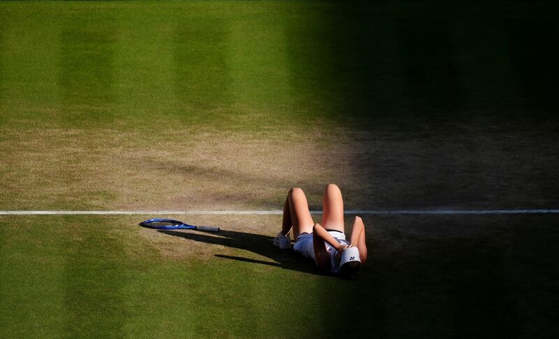 Noskova collapses to the ground in elation after her comeback victory and first Grand Slam win. Pic: John Walton/PA Noskova collapses to the ground in elation after her comeback victory and first Grand Slam win. Pic: John Walton/PA