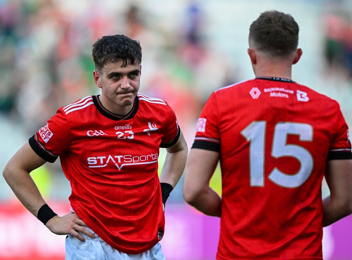Tadgh McDonnell, left, and Ryan Burns hang their heads after being comprehensively beaten by Mayo. Pic: Ray McManus/Sportsfile