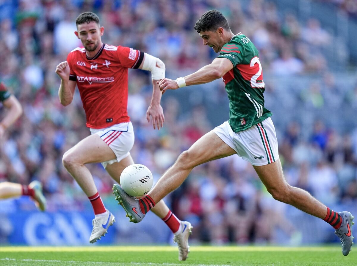 Tommy Conroy of Mayo drives forward with the ball. Pic: James Lawlor/Inpho